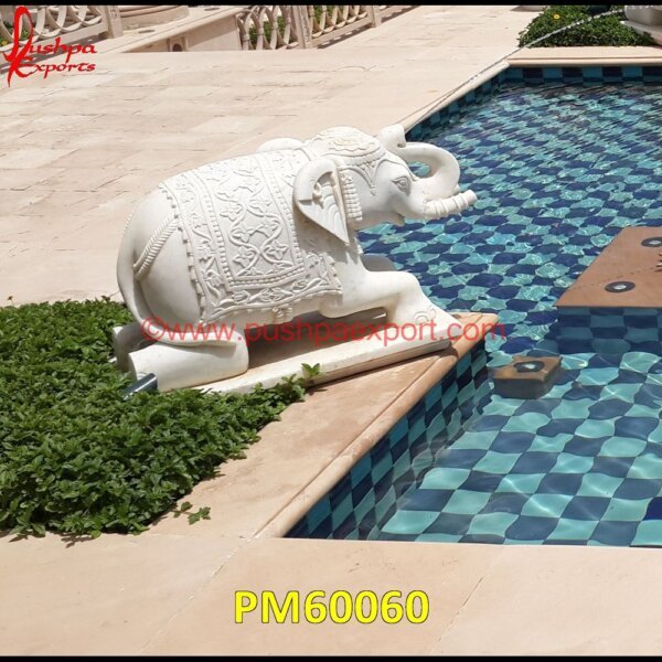 White Marble Siting Elephant Sculpture PM60060 black stone elephant statue,carved marble elephant,carved stone elephant,elephant in stone,elephant inlay,elephant marble arch,elephant soapstone.jpg