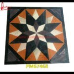 Shape Inlay Work On Black Marble Floor Tile