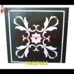 White Flower Inlay On Black Marble Table Top